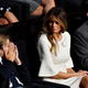 Barron Trump, Melania Trump and Donald Trump Jr. listen to then-Republican presidential candidate Donald Trump deliver his speech on the fourth day of the Republican National Convention on July 21, 2016, at the Quicken Loans Arena in Cleveland.
